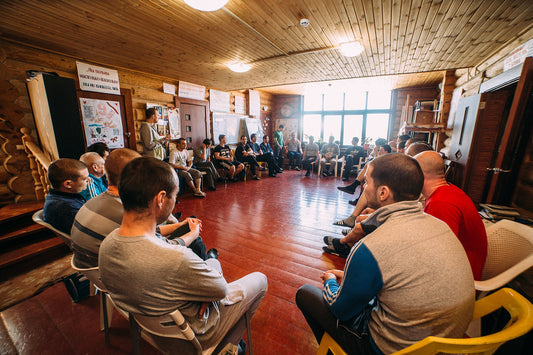 Therapeutic support group in a rehabilitation center; illustrative recovery image, not Presley Gerber