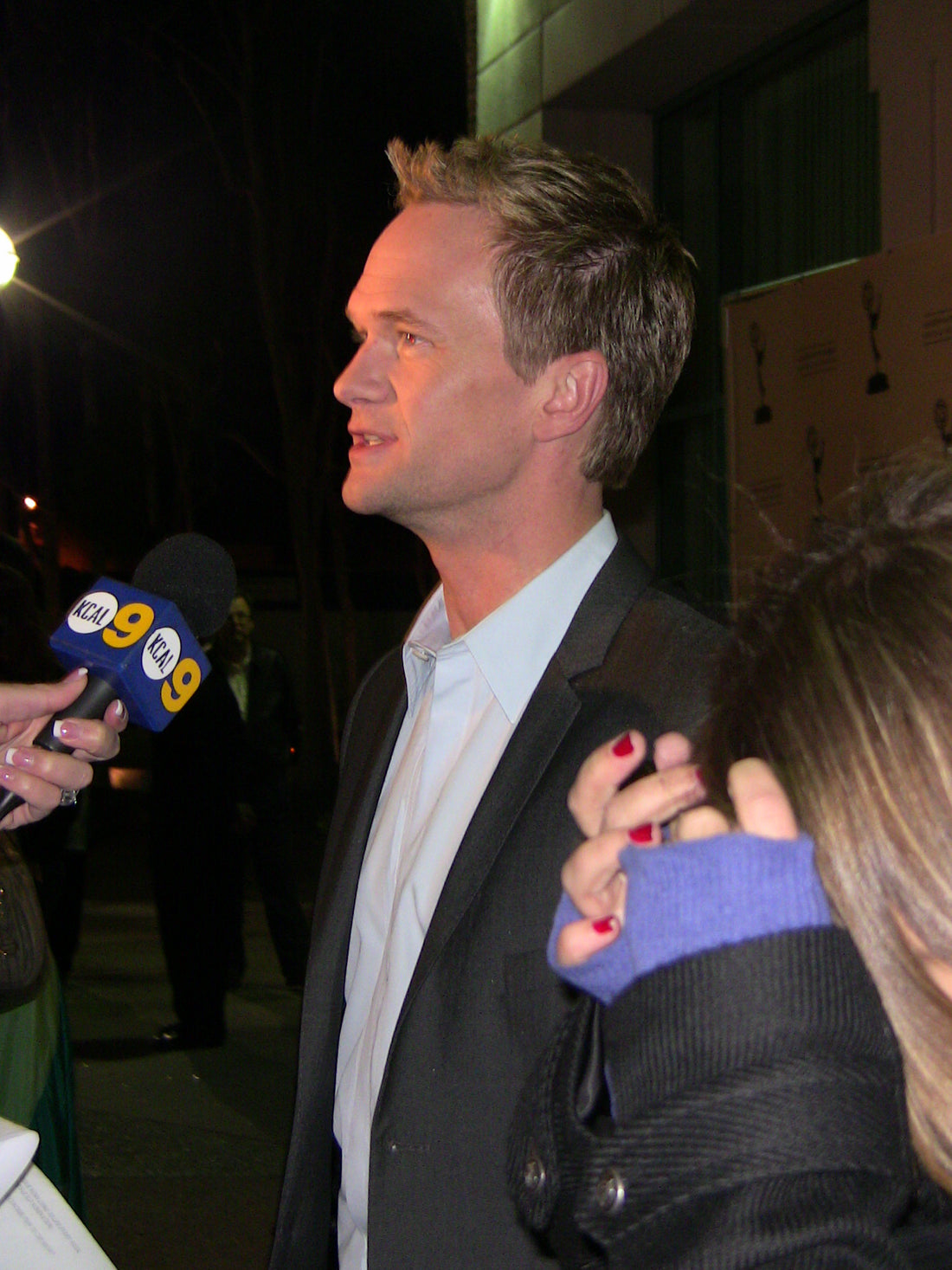 Neil Patrick Harris; photo by Kristin Dos Santos, CC BY-SA 2.0 via Wikimedia Commons. The image does not depict his children.