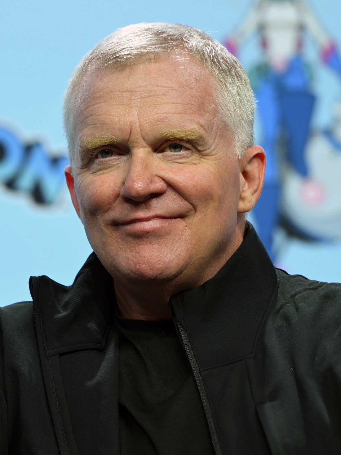 Anthony Michael Hall at GalaxyCon Richmond in March 2024. Photo by Pedro Heshike, CC BY 2.0. Archival image, not from the August 2026 Teen Beat interview.