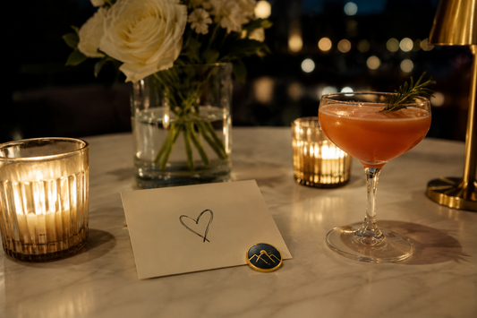 Meaningful recovery milestones represented by a handwritten card, alcohol-free drink and personalized recovery coin.