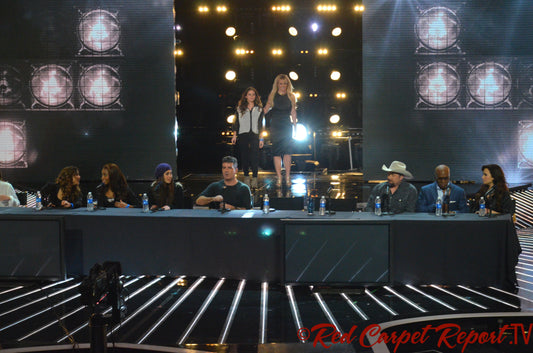 Khloé Kardashian at an X Factor press event; licensed archival wide public-event image.