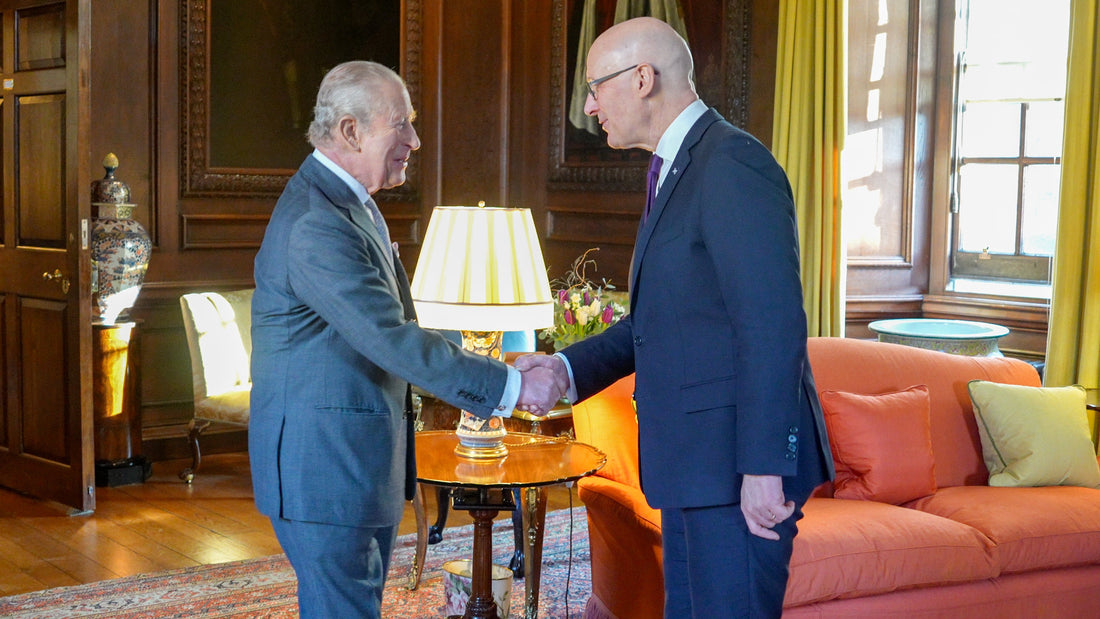 King Charles III at a reception at Holyrood Palace in 2026; wide public-event image.
