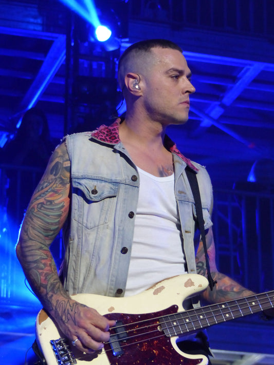Archival photo of Matt Willis performing with Busted at Manchester Arena in 2016.