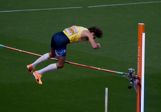 Armand Duplantis in a pole vault final; licensed wide archival athletics image.