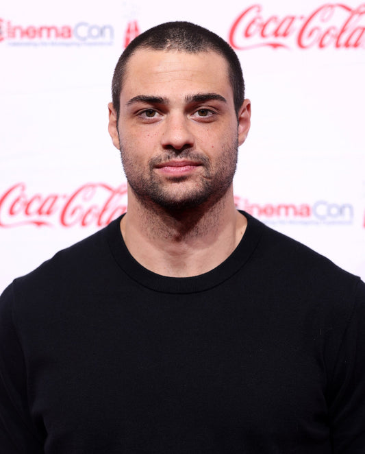 Noah Centineo at CinemaCon in Las Vegas on April 16, 2026. Photo by Gage Skidmore, CC BY-SA 3.0. Archival image, not from the August 2026 Happy Sad Confused interview.