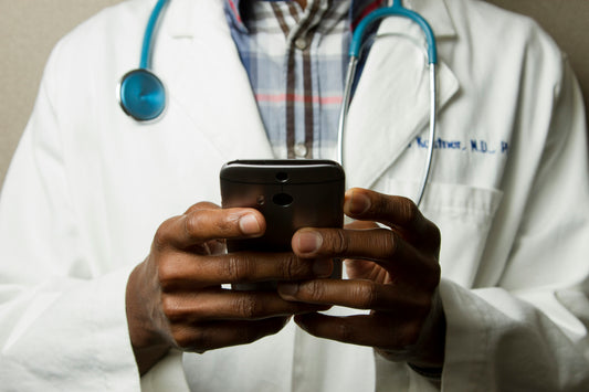 A doctor in a hospital setting, illustrating The Pitt recovery discussion