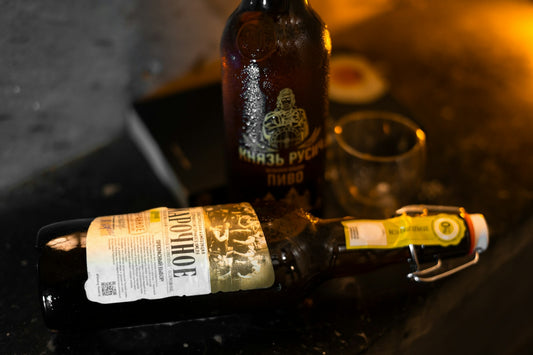 Nonalcoholic beer bottles with a glass