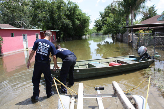 Flood rescue team in Roma, Texas; archival FEMA contextual image.